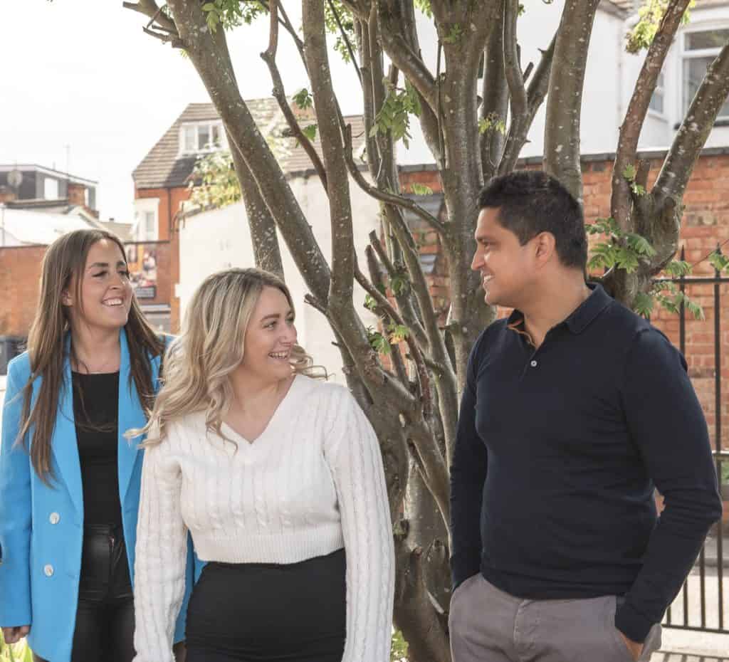 Nishi, Becky and Brooke all smiling